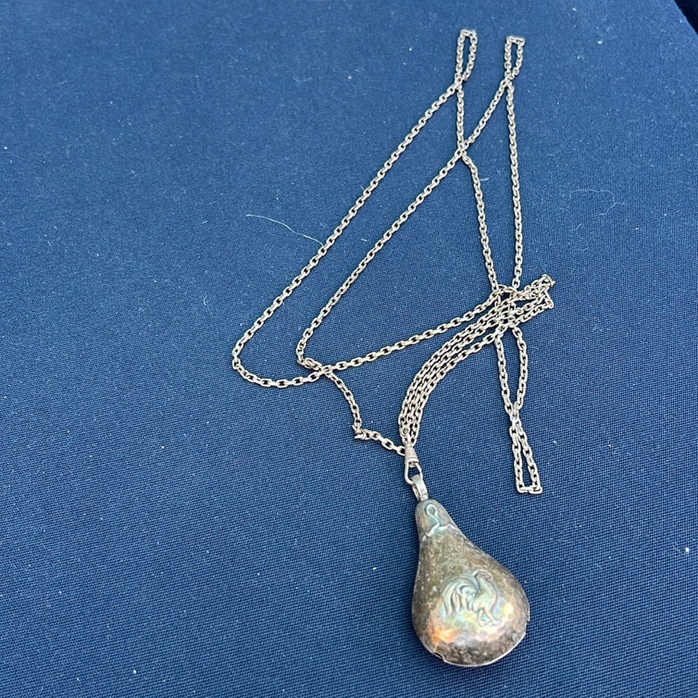 Vintage long silvertone and silverplate necklace.